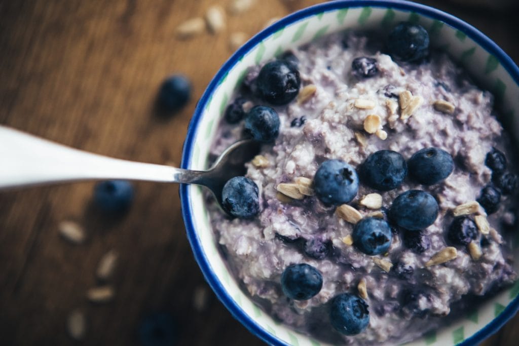 Close up of a bowl of oatmeal with berries